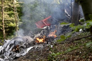 Debris of two sport planes is seen near the village of Cerveny Kamen