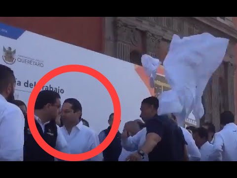  (Video) Trabajadores abuchean y corren al gobernador y su gabinete de desfile del 1 de mayo en Querétaro